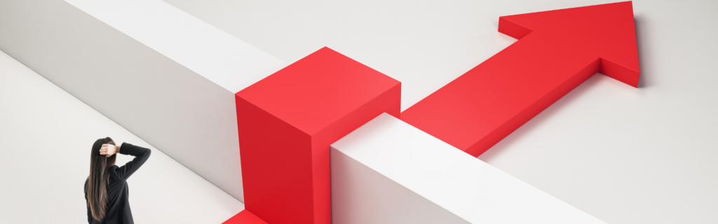 A woman looking at a white space with a red arrow going over an obstacle.