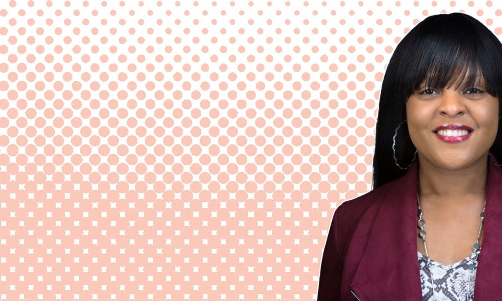 A picture of Kisha Wynter with an orange background.