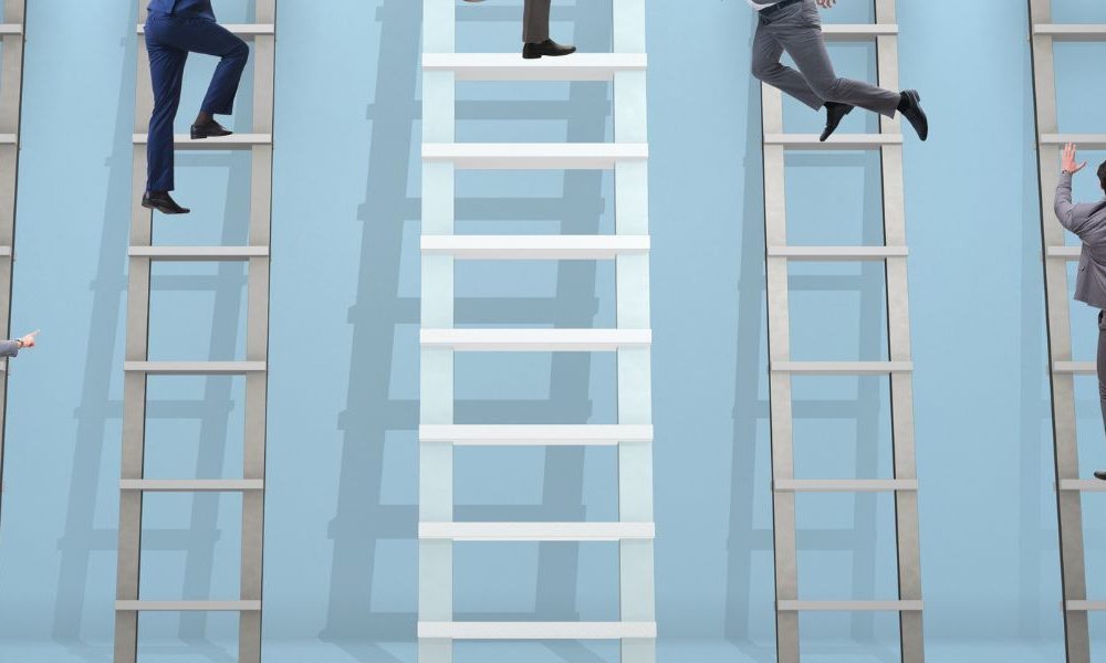 Business people in suits climbing ladders against a blue background.