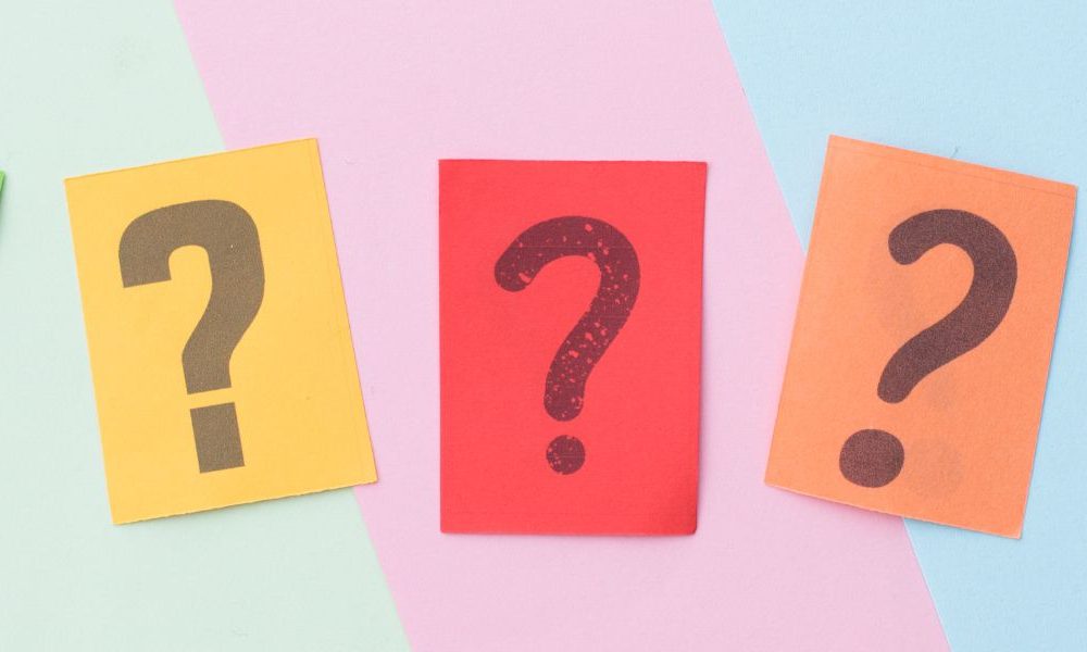 A line of question marks.